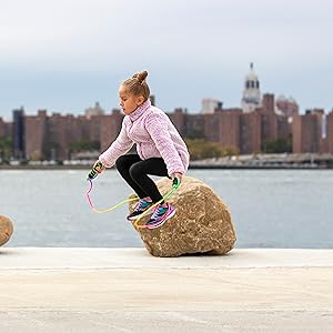 girl jumproping in Saucony sneakers